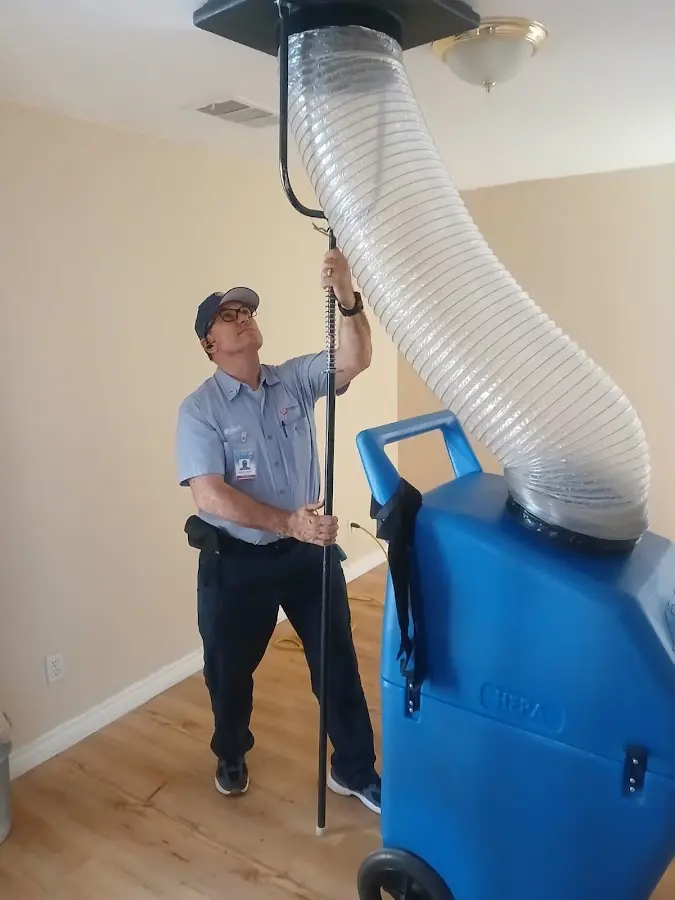 Mini Split Installation technician using HEPA equipment in Sturgeon Bay